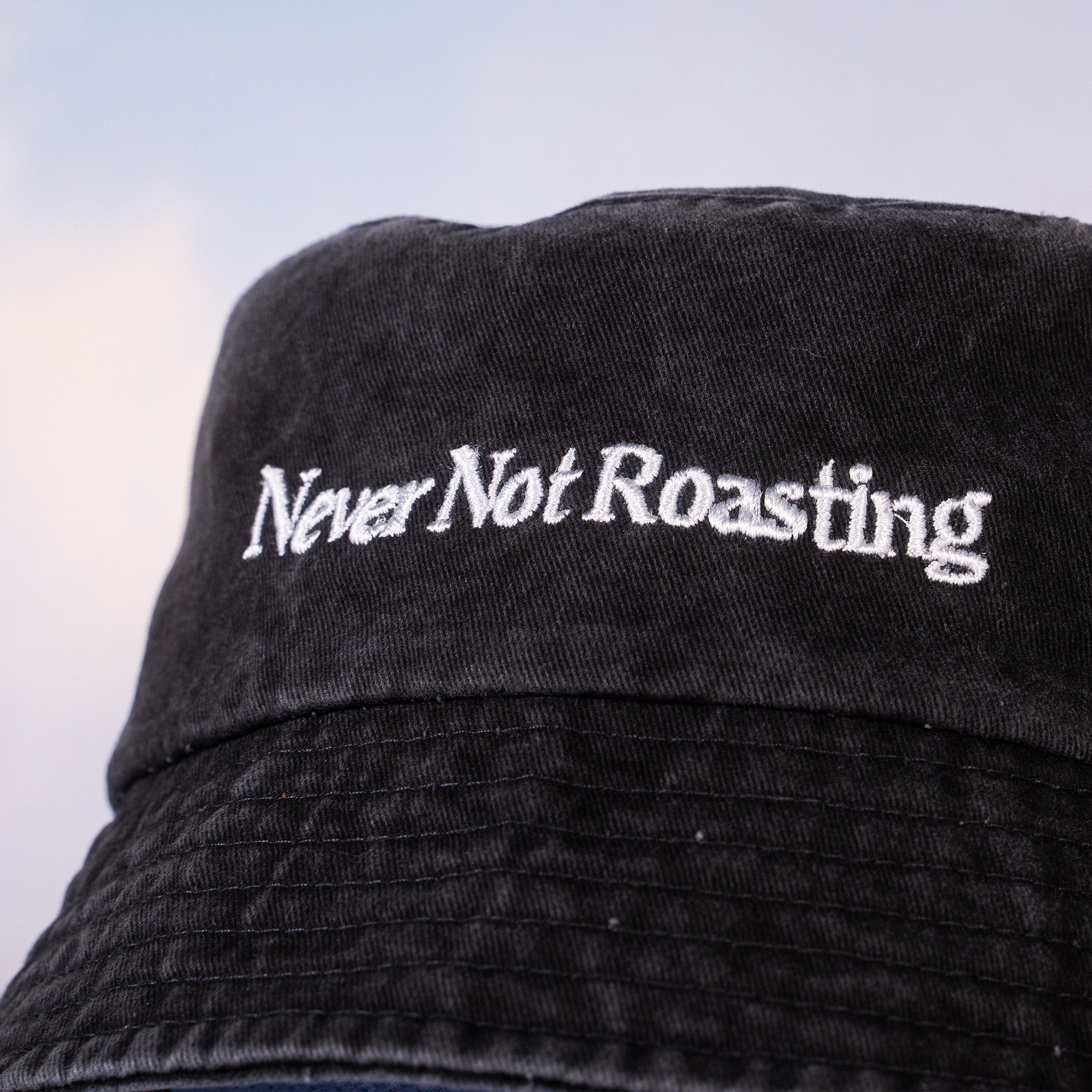 'Never Not Roasting' Washed Black Embroidered Bucket Hat